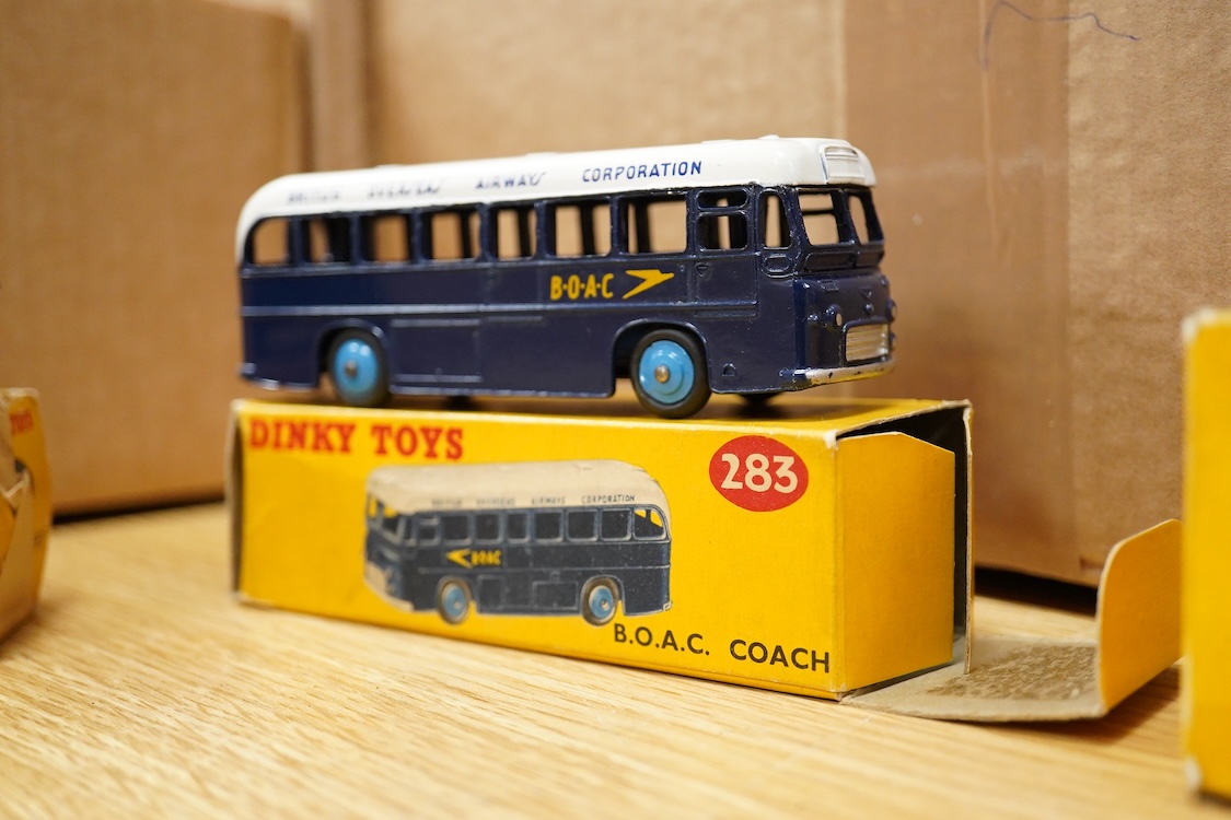 Eight boxed Dinky Toys; Royal Mail van (260), Leyland Atlantean bus (292), Atlas Copco Compressor Lorry (436), Standard Atlas Kenebrake (295), BOAC coach (283), Streamlined Fire Engine (250), Field Artillery Tractor (688
